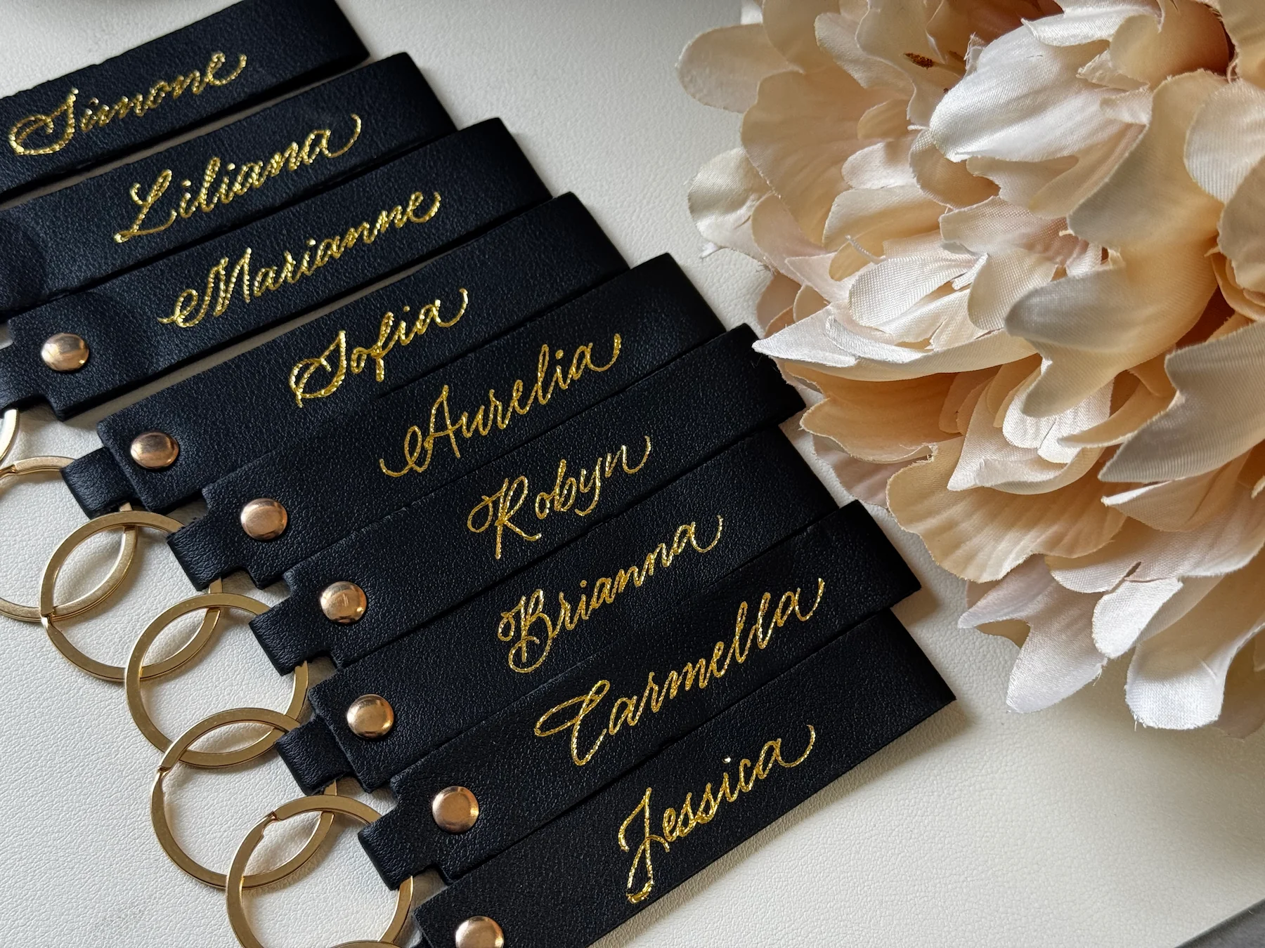 Personalized tags with gold hand lettering